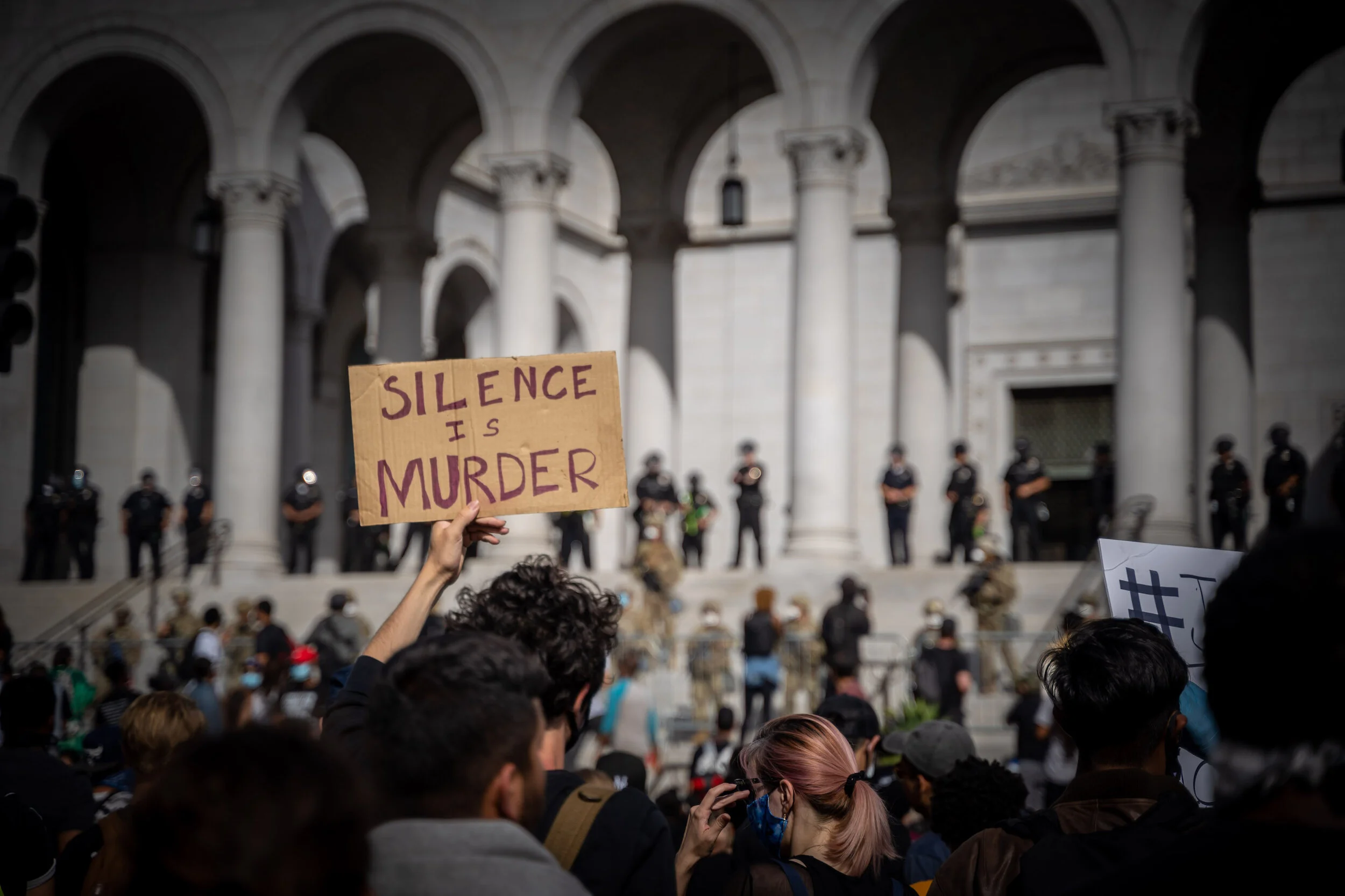 Silence is Murder — protest sign at LA City Hall